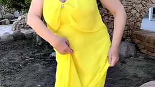 Busty milf Mariaold dances and takes off her stockings for foot fetish lovers