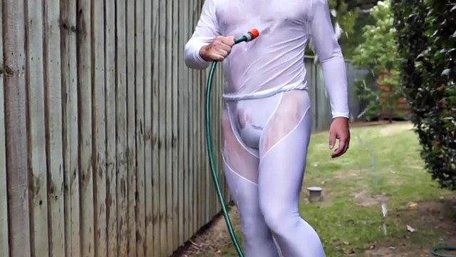 A man in a wet white spandex
