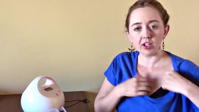 homely milf shows how to pump milk out of both tits