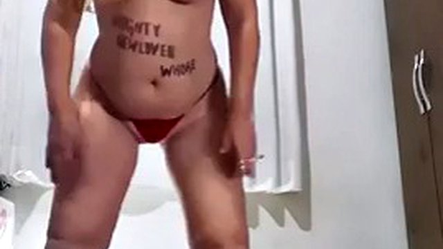 Naughty slut, smoking and undressing