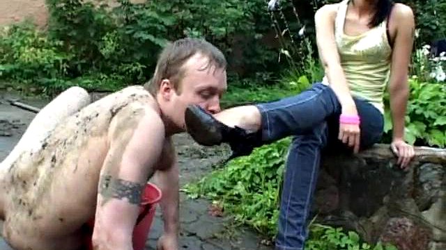 Humiliation of a slave in mud