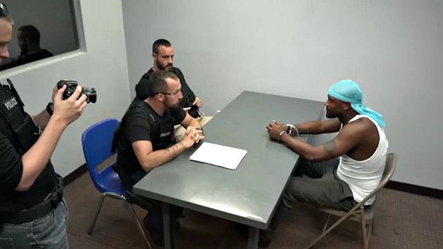 black thug gets a nice blowjob by white male and horny cop inside the police station