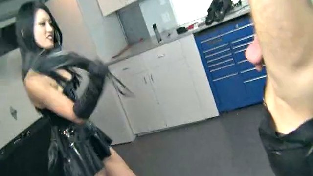 Miki squeezes and spanks the suspended balls