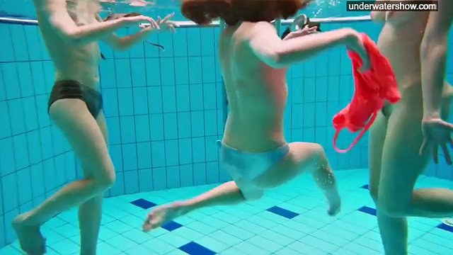 3 naked girls have fun in the water