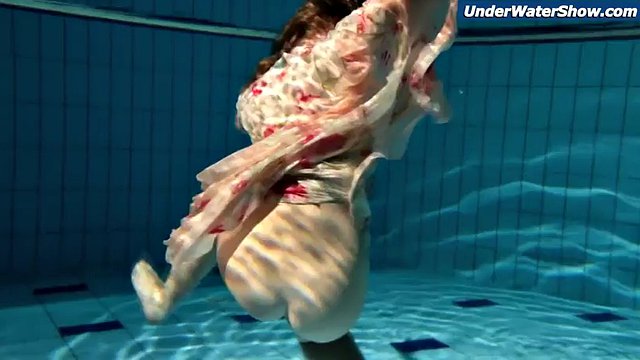 Slow motion teenage girl in Czech swimming