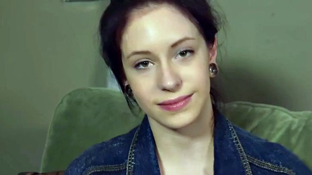Perverted hipster does naked yoga and fingers her wet pussy