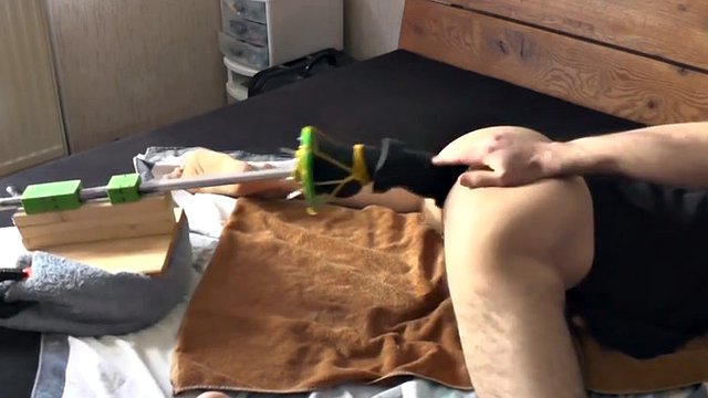 Anal fucking machine with a long dildo