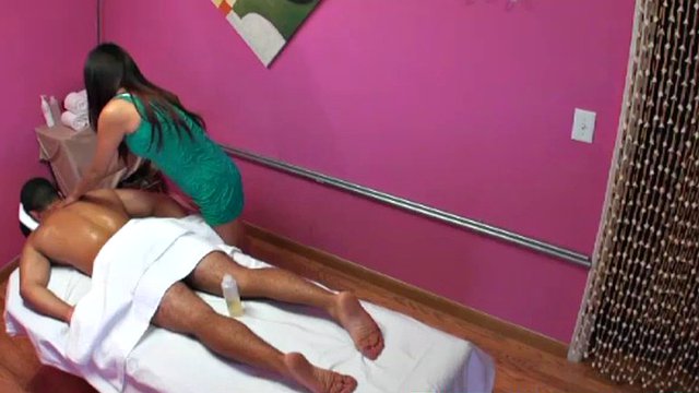 massaging his penis with her hands