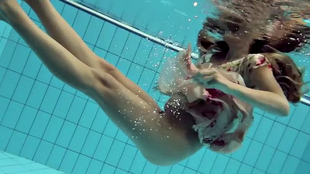 lucy takes the dress off showing her hairy pussy and titties underwater