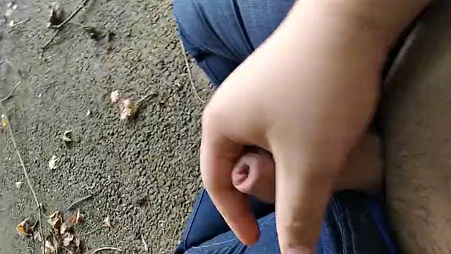 Young fat Asian guy gives a massage, jerks off his dick and cums on the street