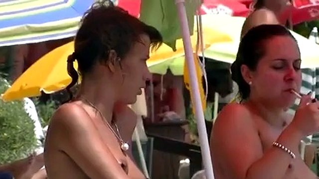 Beautiful young tits - beach voyeur video