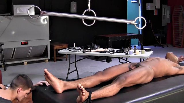 Molesting his BDSM gay sex slave with various sex toys