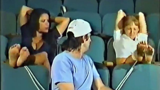 Danny Ashe and Ariele feet bondage at the cinema