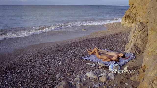 Skinny brunette seduces her man on the beach