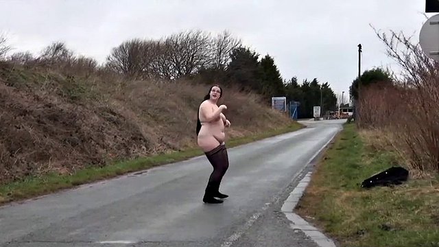 Ugly fat slut walking naked on a public road