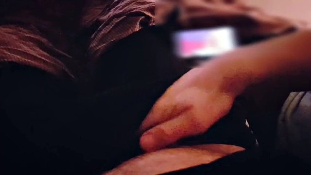 Bi-curious BFF masturbates with her straight husband in bed while their wives are at home watching TV - she almost gets caught during masturbation