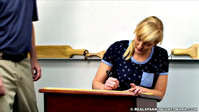 Anne gets hard paddling spanking