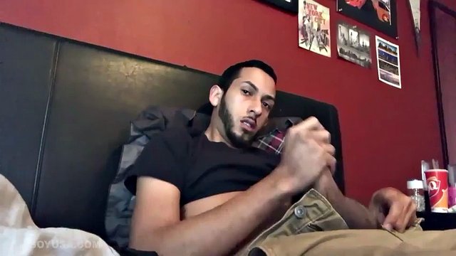 Brian Bonerz starts out in bed, with his pants pulled in just enough to release his big stiff cock and balls. He starts stroking then briefly stops to pull off one of the two shirts he's wearing.