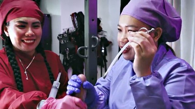 Cruel sadistic nurses tormenting a patient