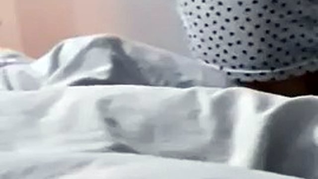 The stepson hides his huge erection under a blanket from the stepmother