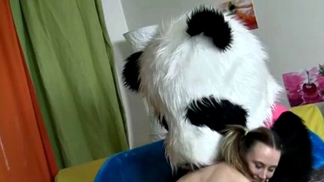 Teddy bear with a pink girl fucking with a dildo